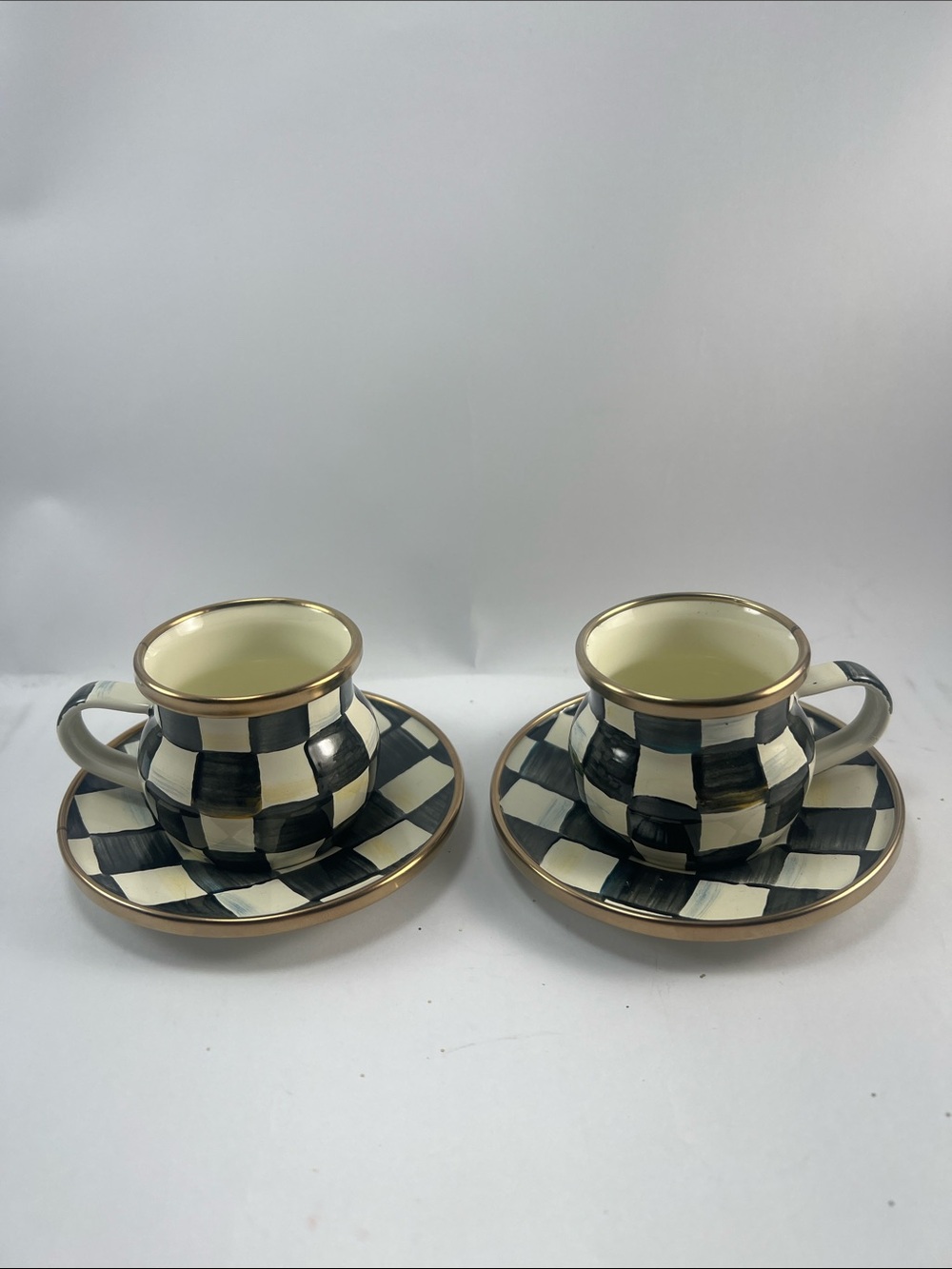 MacKenzie-Childs Black and Cream Check espresso cups with gold trim
